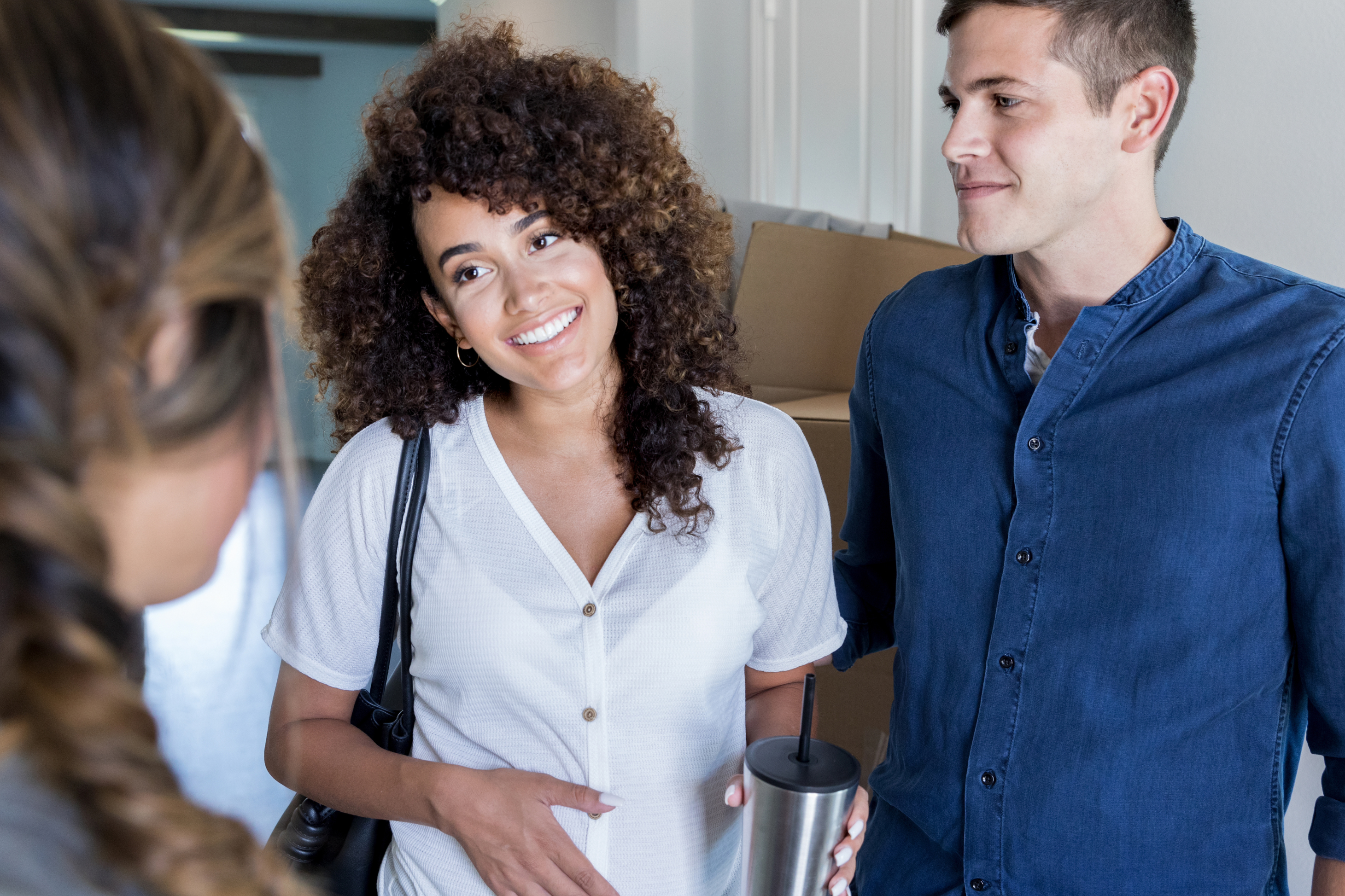 Couple meeting with realtor in home