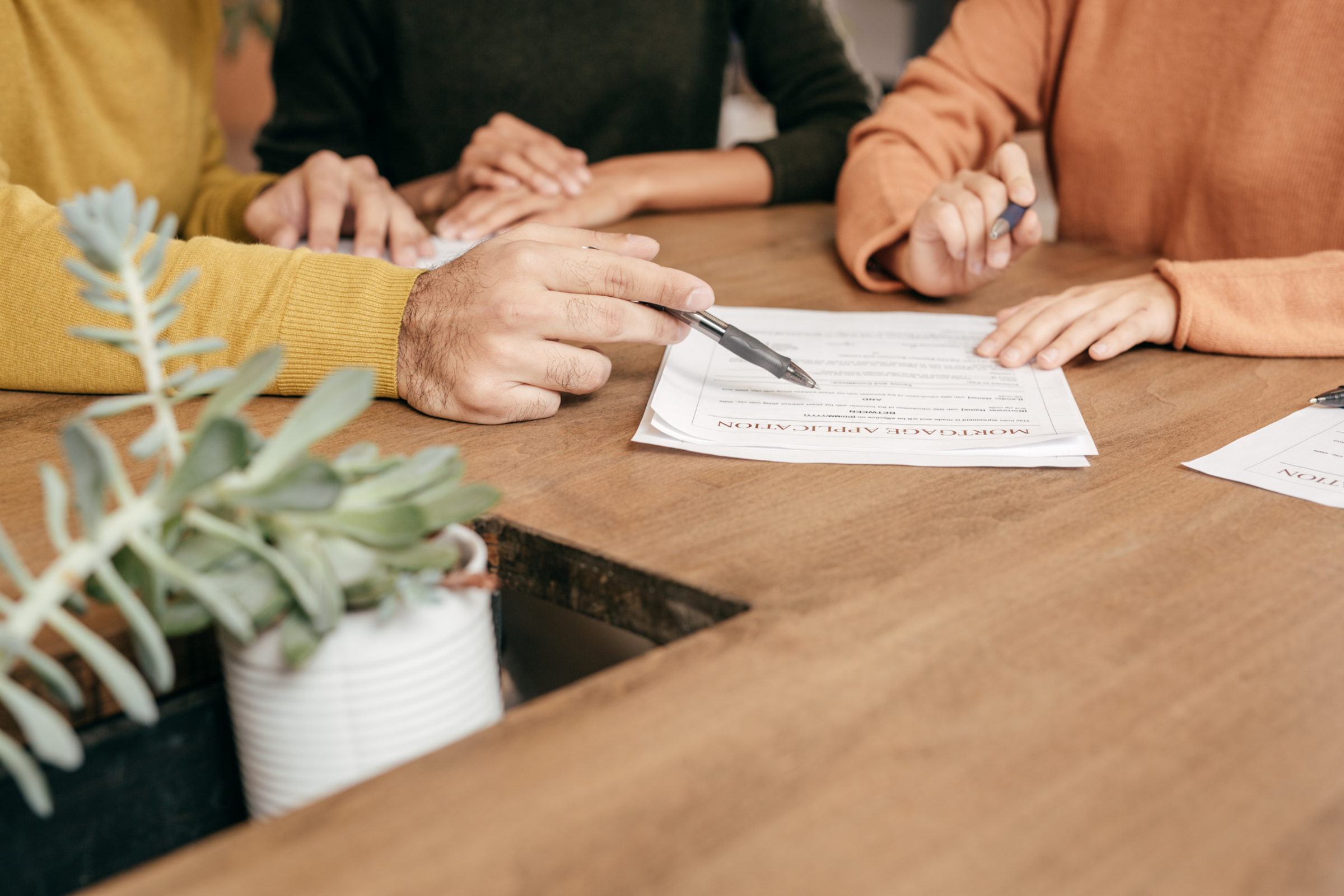 Couple Reviewing Mortgage Document