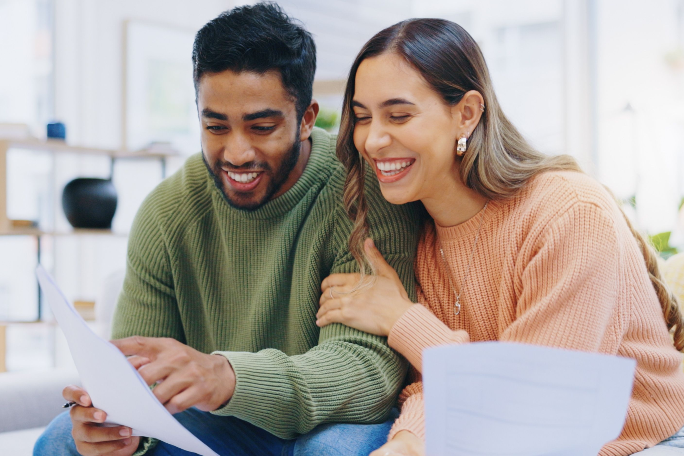 Young couple looking at tax documents together